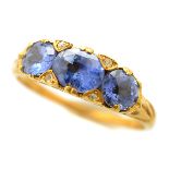 Sapphire, Diamond, 14k Yellow Gold Ring. Featuring three oval-cut sapphires weighing a total of