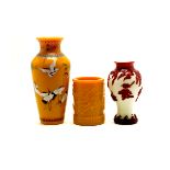 Three Glass Vessels Comprising red overlaid opaque white glass vase, an enamel painted yellow
