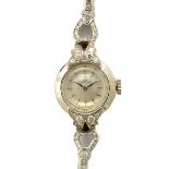 Ladies Omega Diamond, 18k White Gold, Platinum Wristwatch. DIAL: Round, silver, silver line hour