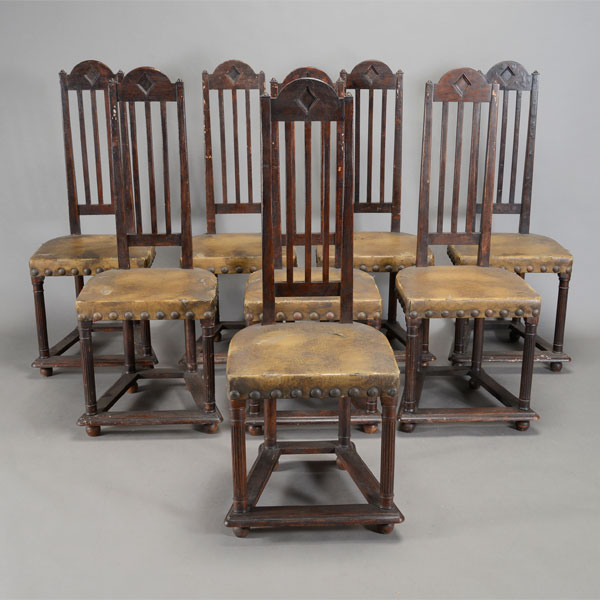 Set of Eight High Back Ebonized Chairs with Leather Upholstery