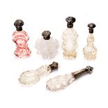 Six Continental Silver Mounted Cut Paneled Glass Scent Bottles