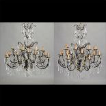 Pair of Patinated Bronze Twenty Four Light Chandeliers, hung with lustres