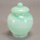 A Celadon Glass Jar with Cover