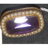 An amethyst & pearl set brooch