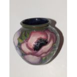 A boxed Moorcroft Anemone Tribute vase by Emma Bossons – 1999, 2.75”