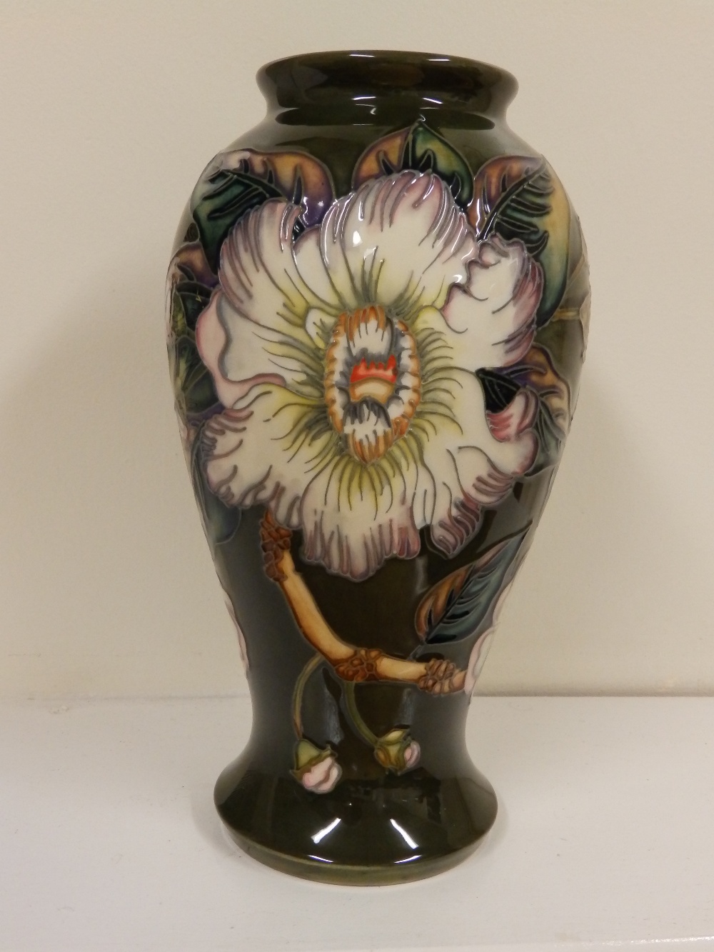 A boxed Moorcroft Gustavia pattern vase