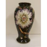 A boxed Moorcroft Gustavia pattern vase