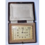 A Swiss gilt metal art deco 8 day travelling  clock in case