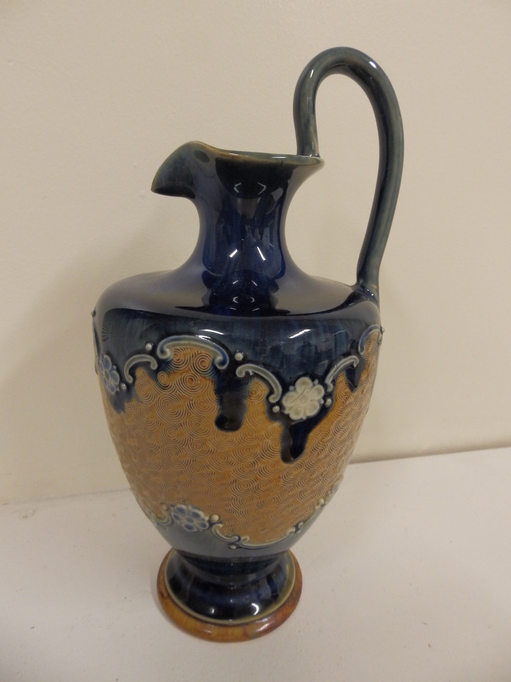 A Doulton Silicon Ware jug – cracks to neck and handle