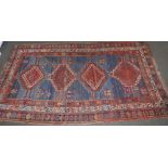 A Caucasian rug with pale blue ground, 92” x 48”