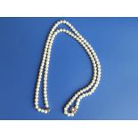 A twin strand pearl necklace with 9ct clasp