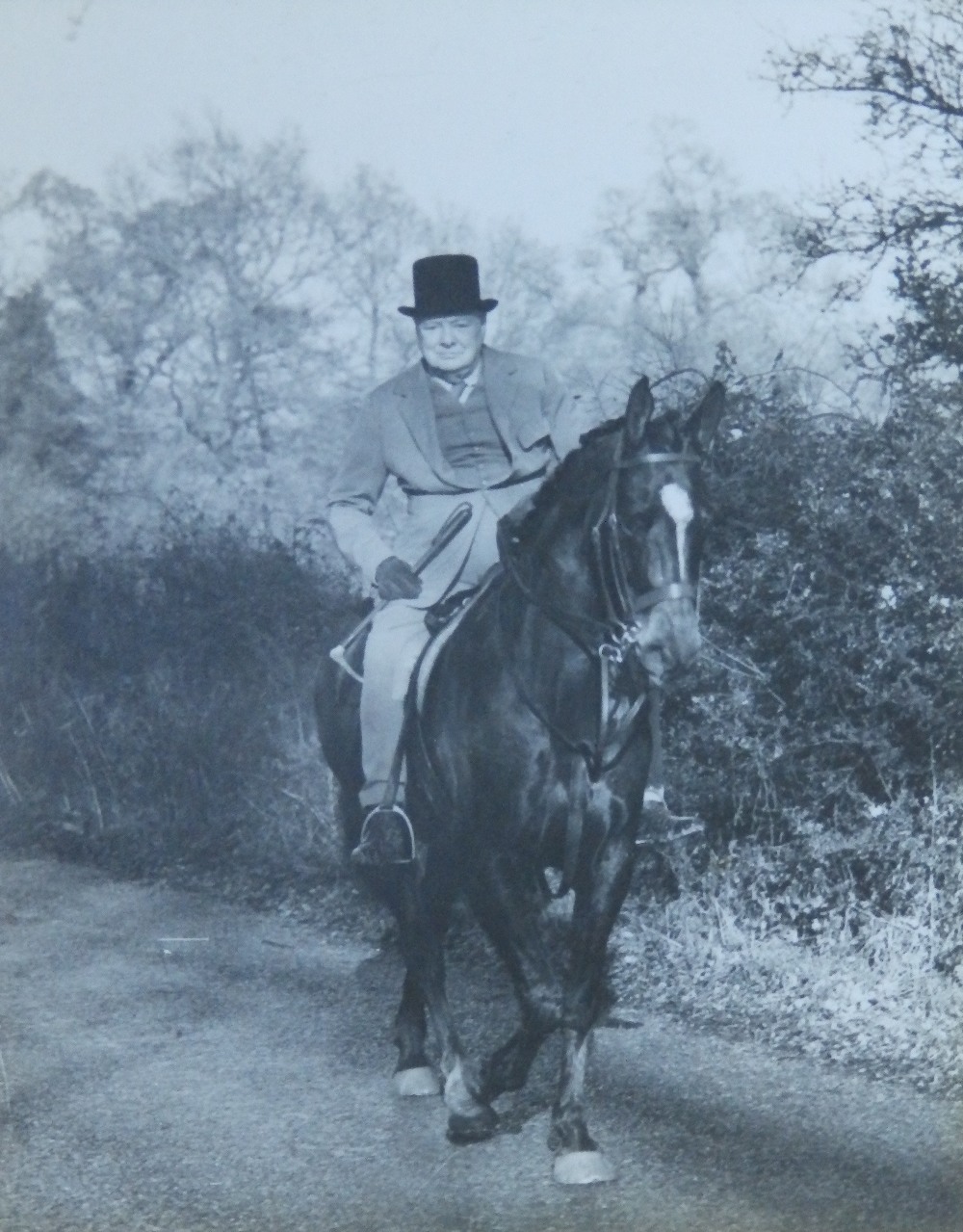 A 1948 press publicity photo of Winston Churchill on horseback, 9.5” x 7.5” (this may be seen