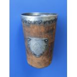 A George III silver mounted leather beaker