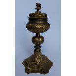 A 17thC gilt copper ciborium, the detachable cover with bird finial, the knopped stem to hexafoil