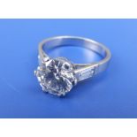 A diamond solitaire ring, the brilliant cut stone weighing 2.04 carats, of approximate colour H,