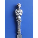 A 19thC French silver-handled cheese knife, the handle modelled as a bearded naked male figure