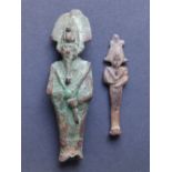 An Ancient Egyptian figure of Osiris, 4.5” - base incomplete, and a small wooden shabti (2)