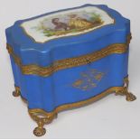 A 19thC Sevres style ormolu mounted porcelain scent bottle casket, of serpentine plan, containing