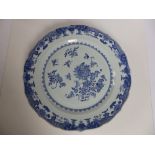 A 19thC Chinese blue & white porcelain charger, of circular plan with ogee rim, the centre painted