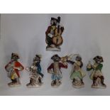 A German porcelain monkey band – underglaze blue crossed swords marks, together with one other