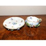 A small Meissen style floral encrusted porcelain cup & saucer (2)