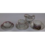 A New Hall cream jug and three various New Hall cups & saucers (7)
