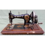 A vintage Jones sewing machine – base woodwormed