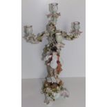 A 19thC German porcelain four branch candelabrum, modelled with a shepherd – double crossed