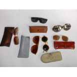 A pair of Fred Lapidus sunglasses and five other pairs (6)