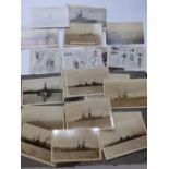 An old album of postcards, including battleships
