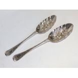 A pair of silver berry spoons – London 1733 – later decoration