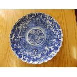 An Oriental blue & white fluted charger