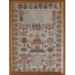 A George IV coloured silkwork sampler, worked with a depiction of a temple to centre flanked by