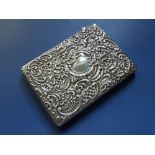 An embossed Edwardian silver card case – WH & Co, London 1903