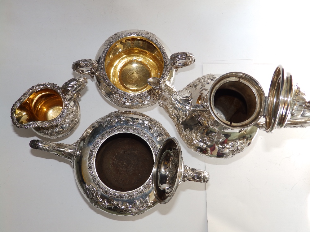 An early Victorian four piece silver tea & coffee service, of circular plan the sides of double ogee - Image 2 of 5