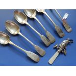 A silver 'Punch' baby's rattle – Birmingham 1931 and six various teaspoons (7)