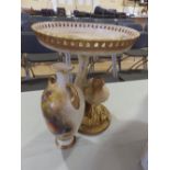 A damaged Royal Worcester grouse centrepiece,9.25” together with a damaged vase painted still life