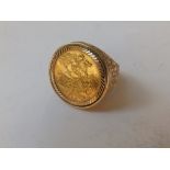 A half sovereign ring.