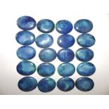 20 blue oval Ruskin cabochon plaques.