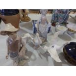 A pair of Lladro figures and four Lladro geese (6)