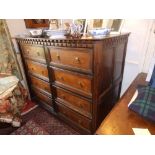 A late 17thC/early 18thC oak chest of drawers, the dentil moulded cornice over eight short drawers