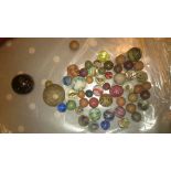 A collection of early glass marbles.