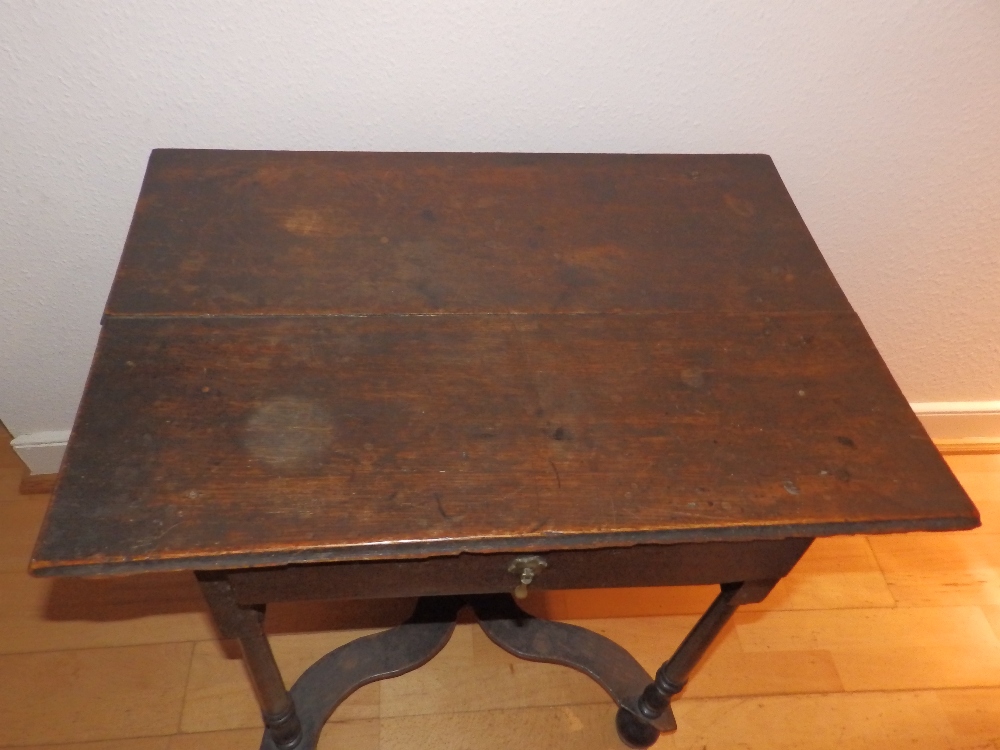 A late 17th/early 18thC oak side table, with frieze drawer over slender turned legs united by shaped - Image 2 of 3