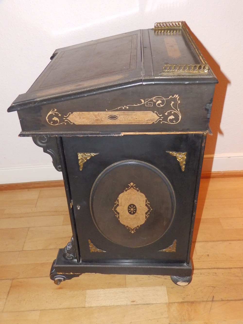 A Victorian ebonised davenport with marquetry walnut panels and ormolu mounts, the threequarter - Image 5 of 5