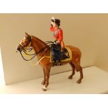 ,A boxed limited edition Beswick equestrian figure “Queen Elizabeth II on Horseback, the first