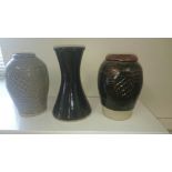 Three Jeremy Leach pottery vases.