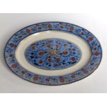 An oval decorated earthenware dish by A. J. Meir – ex shipping line use.