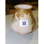 A Royal Worcester rose pattern vase.