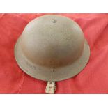 A WWII British helmet – the shell stamped 1939, the liner – 1940.
