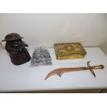 A WWI trench art letter opener, a 1914 Christmas Ration tin, a figure of 'Old Bill' and a quantity